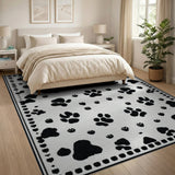 Playful Black Paw Print Area Rug