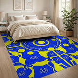 Vibrant Yellow Tribal Faces on Blue Area Rug