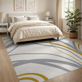 Gold Swirl Abstract Area Rug in Gray