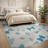 Distressed Blue Butterfly Silhouette Area Rug
