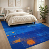 Geometric Blue Area Rug with Orange Sun Accents