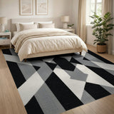 Bold Black White Geometric Triangle Rug