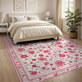 Delicate Pink Floral Area Rug with Red Border