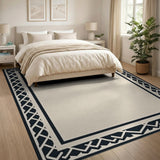 Beige Area Rug with Black Geometric Border