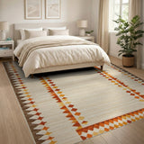 Beige Southwestern Area Rug with Orange Geometric Borders