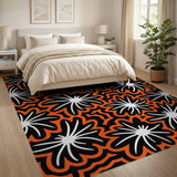 Bold Orange Black White Starflower Area Rug