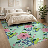 Vibrant Pink Hibiscus Floral Area Rug on Mint Green