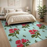 Vibrant Red Flowers on Teal Area Rug