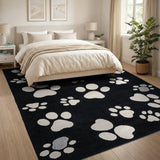 Playful White Paw Print Area Rug on Black
