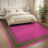 Vibrant Pink Rug with Ornate Palm Frond Border