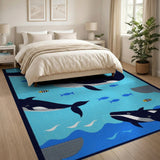Playful Cartoon Whales Ocean Area Rug
