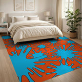 Vibrant Blue Splatter on Orange Abstract Area Rug