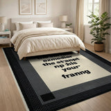 Distressed Framed Text Black White Area Rug