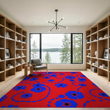 Vibrant Blue Daisy Floral Area Rug on Red