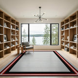 Bold Black White Geometric Area Rug with Red Border