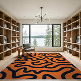 Vibrant Orange Black Squiggle Abstract Area Rug