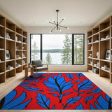 Vibrant Blue Feathers on Red Area Rug