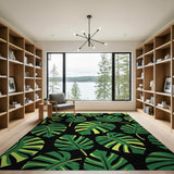 Bold Green Monstera Leaves on Black Area Rug