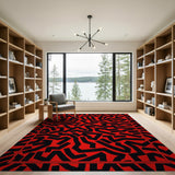 Vibrant Red Geometric Area Rug with Black Shapes