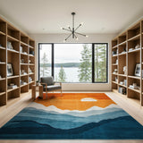 Sunset Over Layered Mountains Area Rug