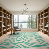 Blue and Teal Wavy Abstract Area Rug on Cream