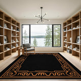 Ornate Orange Swirl Border Black Area Rug