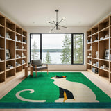 Playful Black Cat on Vibrant Green Area Rug