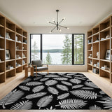 Bold White Palm Fronds Area Rug on Black