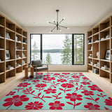 Bold Red Floral Pattern Area Rug on Teal