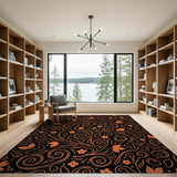 Vibrant Orange Floral Vines on Black Area Rug
