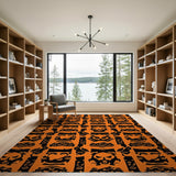 Bold Orange Skull Mask Area Rug