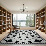 Playful Black Paw Print Area Rug