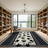 Pixelated Black Paw Print Area Rug