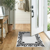 Black and White Ornate Black Floral Frame Area Rug