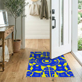 Vibrant Yellow Tribal Faces on Blue Area Rug