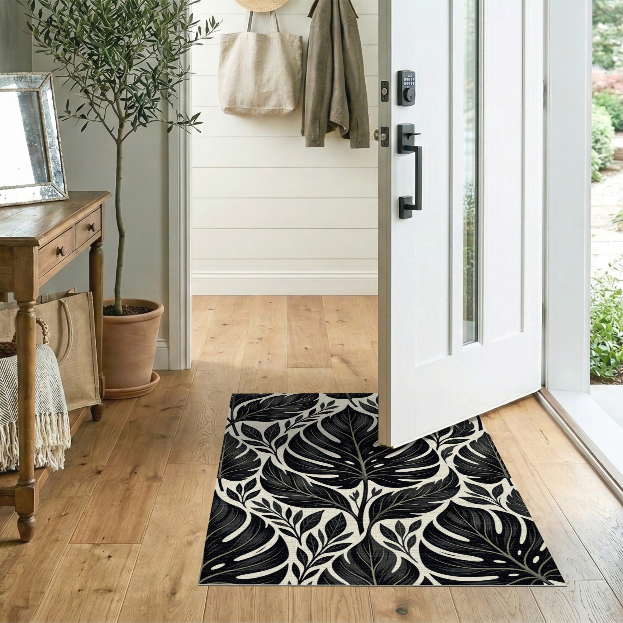 Bold Monstera Leaf Black White Area Rug