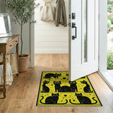 Playful Black Cats on Vibrant Yellow Rug