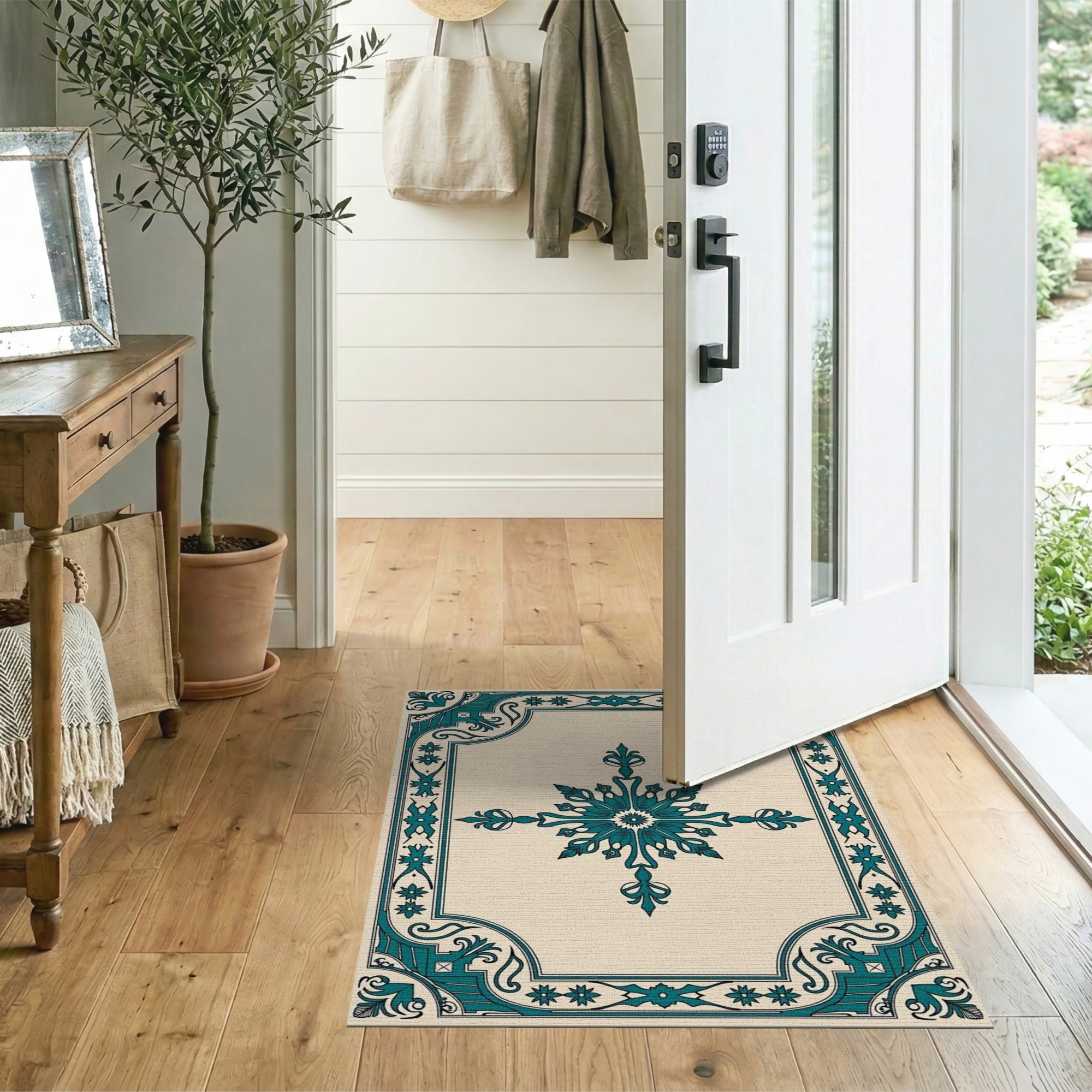 Ornate Teal Snowflake Motif Cream Area Rug