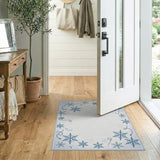 Blue Snowflake Swirl Border Area Rug