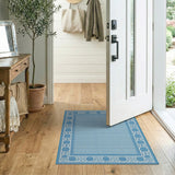 Light Blue Woven Rug with Ornate White Lace Border