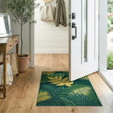 Golden Monstera Leaf Area Rug on Emerald Green