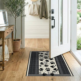 Pixelated Black Paw Print Area Rug