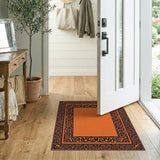 Vibrant Orange Rug with Ornate Black Border
