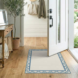 Beige Area Rug with Ornate Blue Knot Border