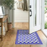 Intricate Blue and White Floral Area Rug