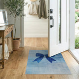 Oversized Blue Bow Silhouette Area Rug