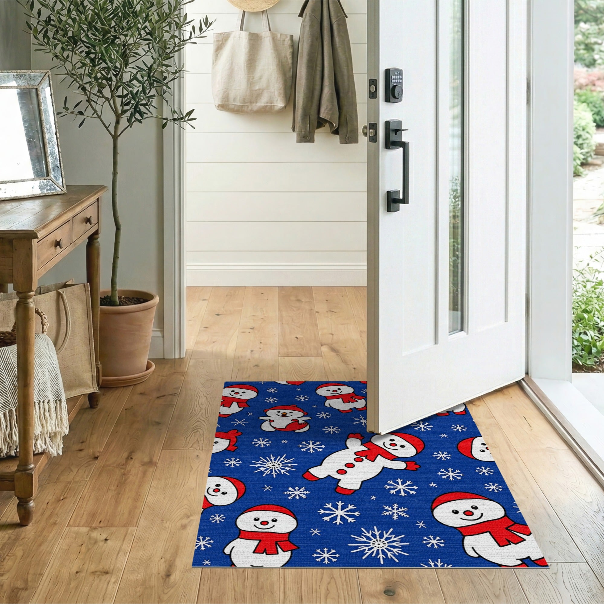 Playful Cartoon Snowmen on Blue Snowflake Rug