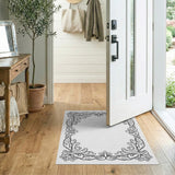 Ornate Floral Scroll Black White Rug