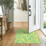 Whimsical Teal Leaf Swirls on Yellow Area Rug