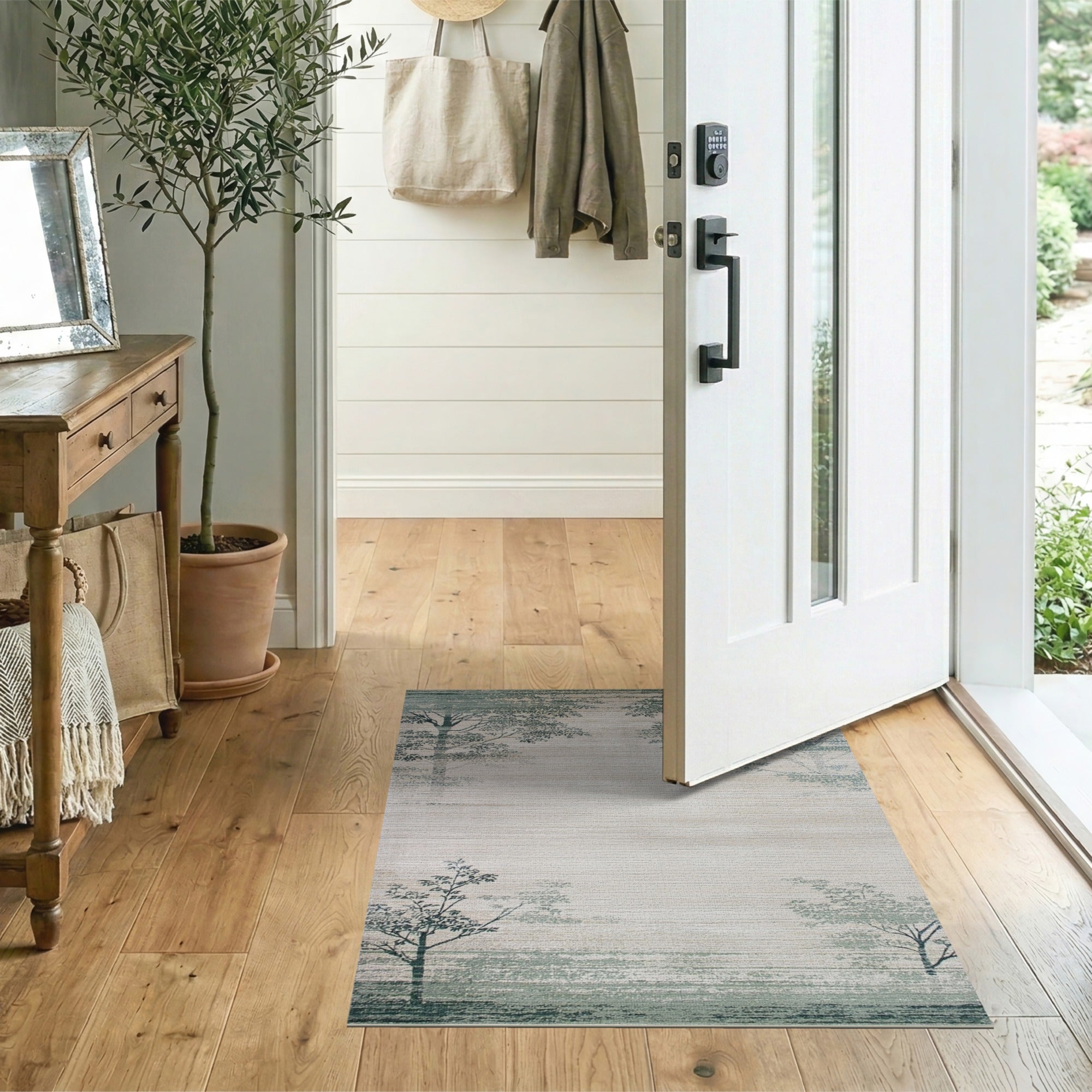 Faded Teal Tree Silhouette Distressed Area Rug